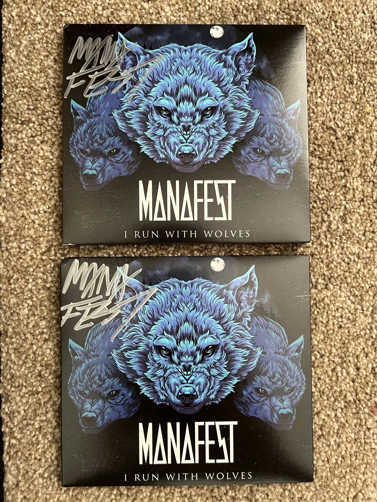 Signed I Run With Wolves CD + Digital Download – Manafest